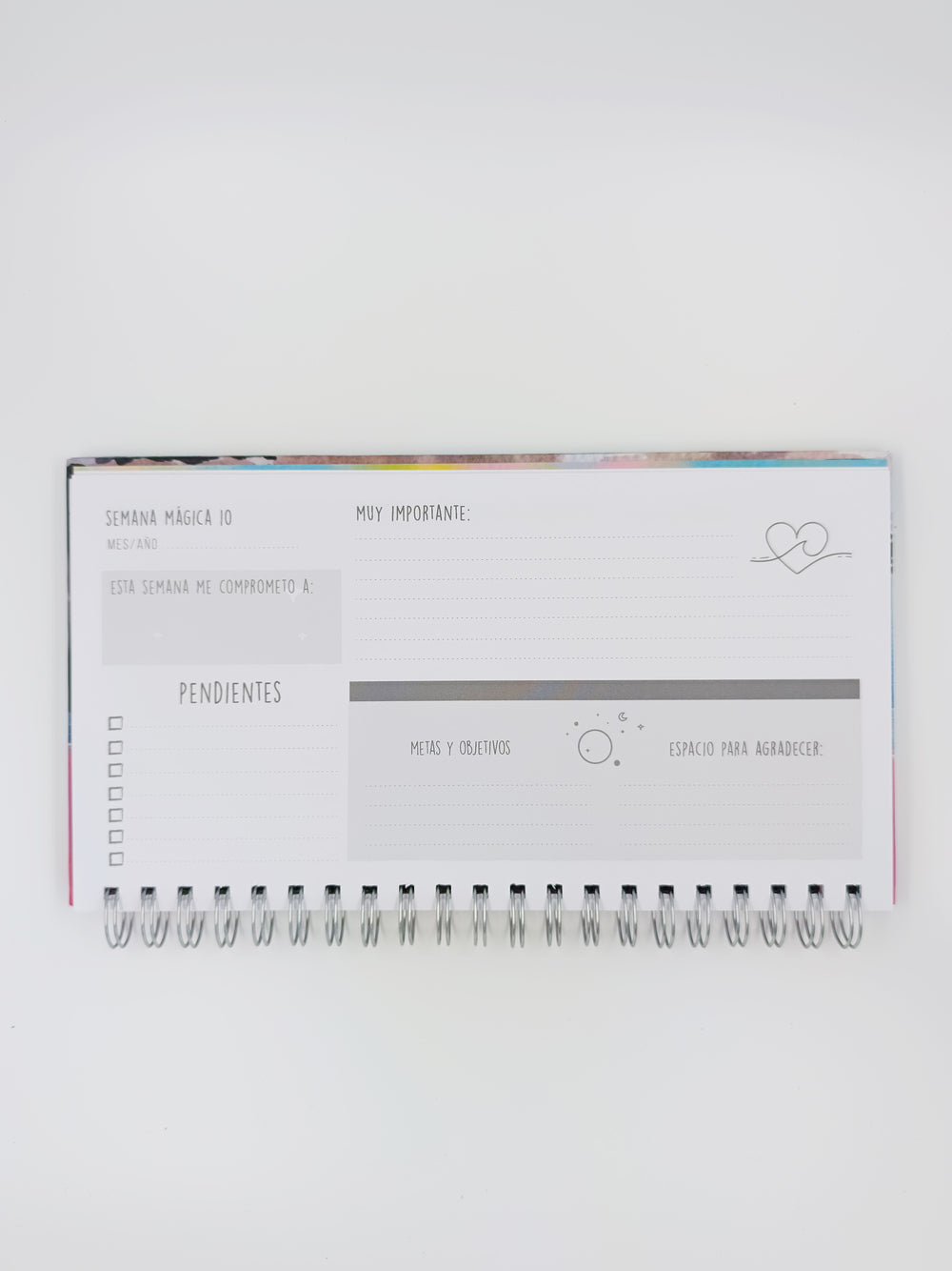 Vista interior del Planner Costa – organización semanal con diseño artístico